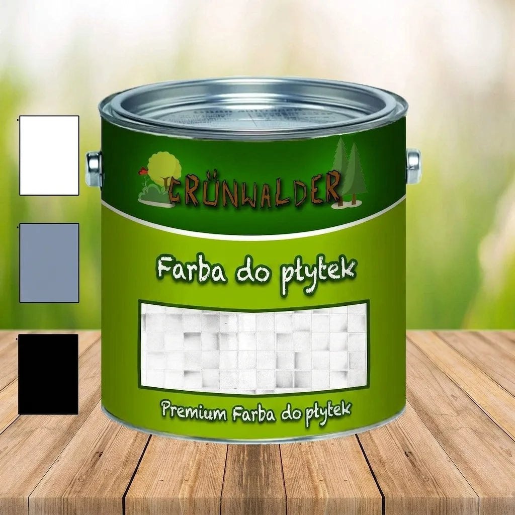 Zielona puszka farby „Grünwalder Fliesenlack” na płytki, z próbkami koloru białego, szarego i czarnego na drewnianym stole.