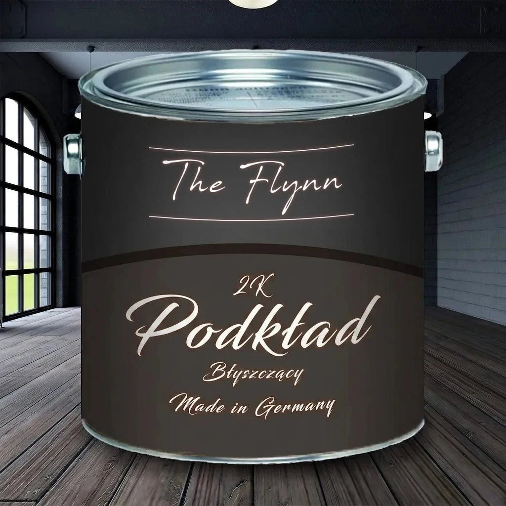 Czarna puszka farby The Flynn 2K Grundierung (podkład), błyszczący, Made in Germany, na drewnianej podłodze.